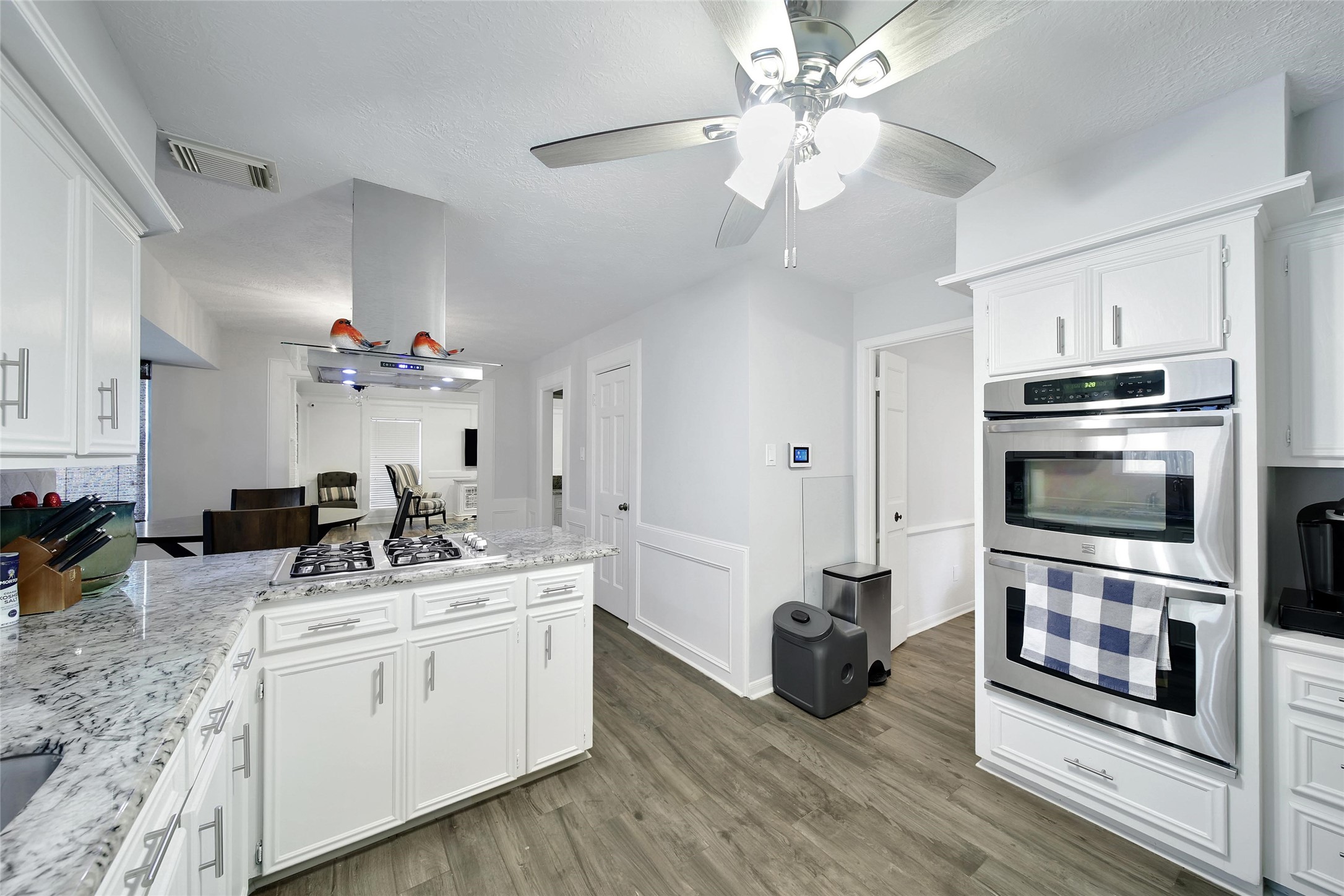 6522 Castle Pine Lane Spring, TX 77379 - Photo 15 of 38 a kitchen with a sink stainless steel appliances and cabinets