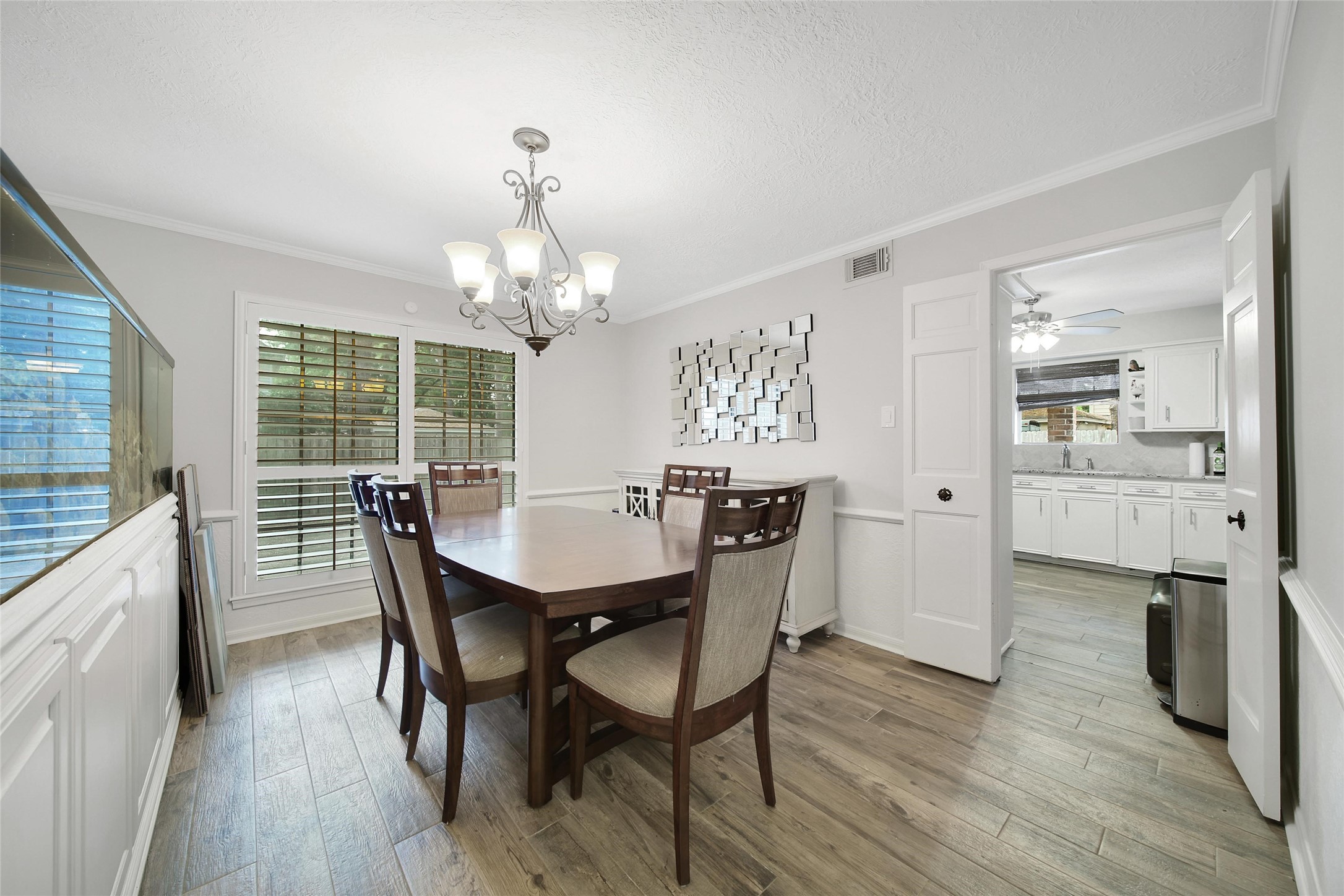 6522 Castle Pine Lane Spring, TX 77379 - Photo 18 of 38 a view of a dining room with furniture window and wooden floor
