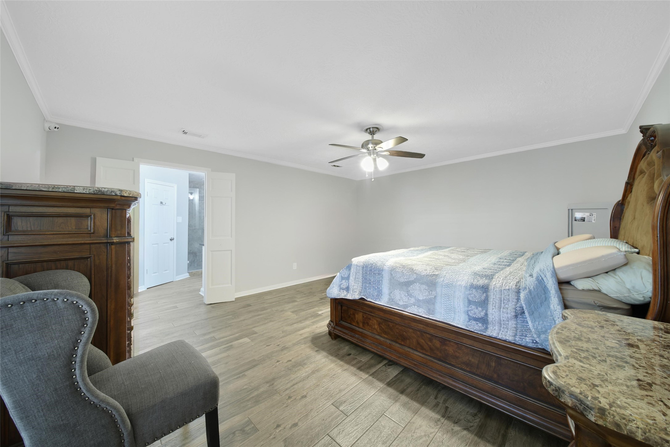 6522 Castle Pine Lane Spring, TX 77379 - Photo 20 of 38 a bedroom with bed and chair