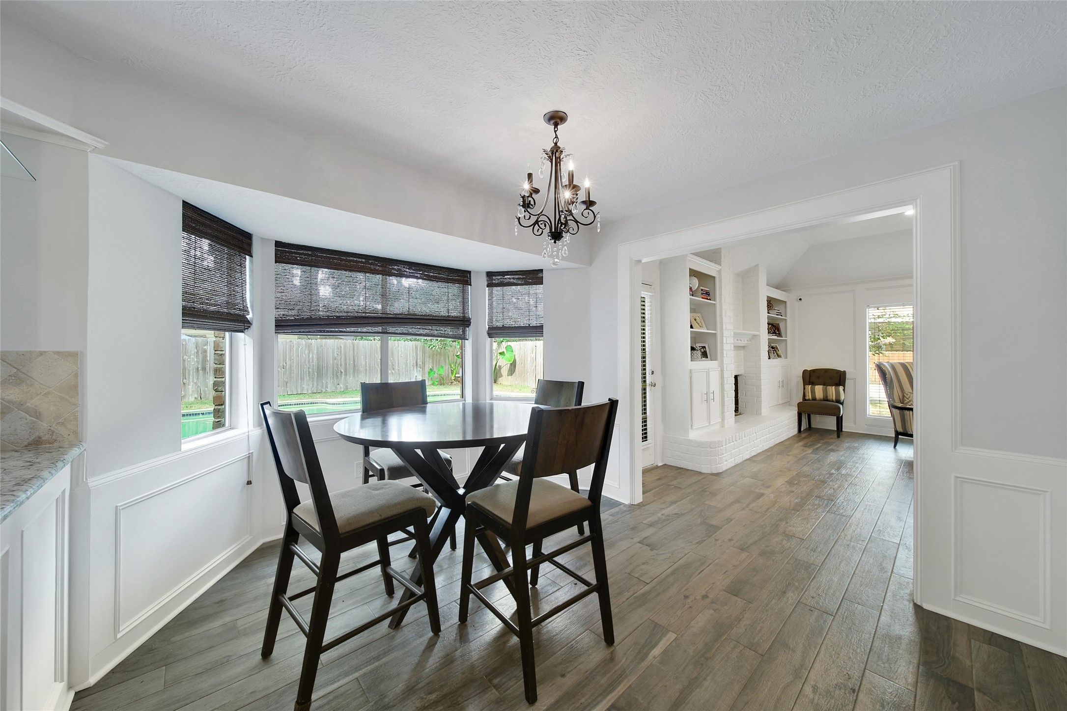 6522 Castle Pine Lane Spring, TX 77379 - Photo 10 of 38 a view of a dining room with furniture window and wooden floor