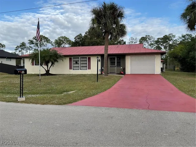 $299,900 | 1002 Michael Avenue, Lehigh Acres, FL 33936