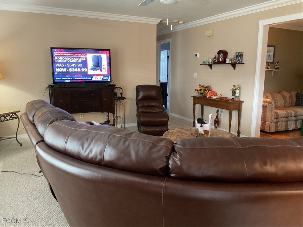 1002 Michael Avenue Lehigh Acres, FL 33936 - Photo 11 of 34 a living room with furniture