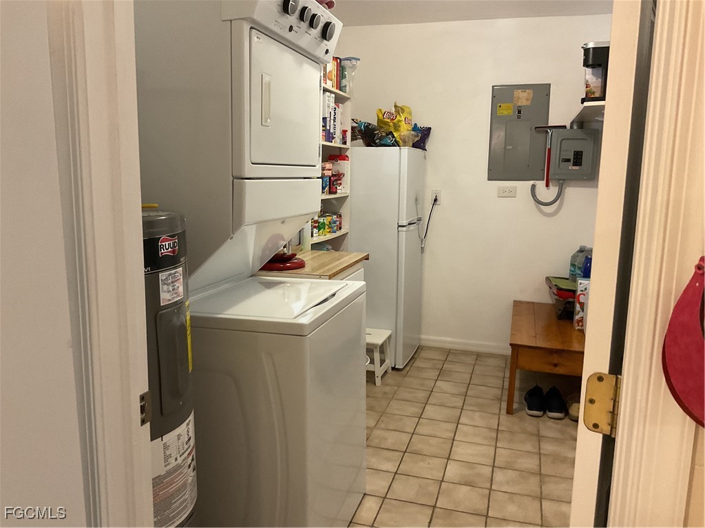 1002 Michael Avenue Lehigh Acres, FL 33936 - Photo 15 of 34 a room with storage and utility