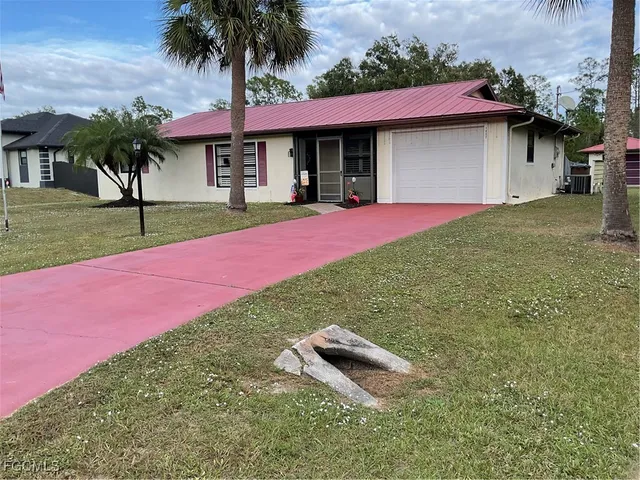 $299,900 | 1002 Michael Avenue, Lehigh Acres, FL 33936