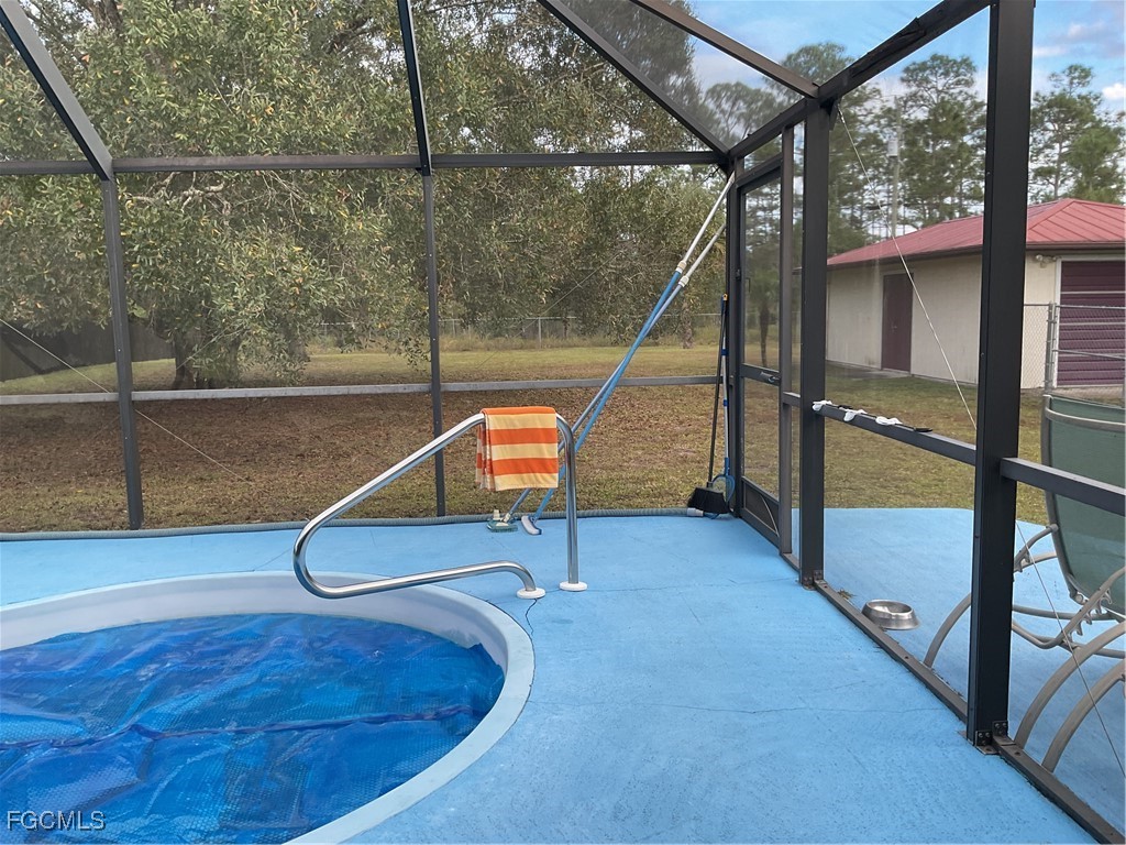 1002 Michael Avenue Lehigh Acres, FL 33936 - Photo 24 of 34 a view of a slide