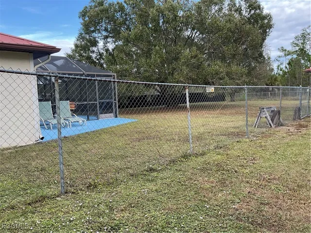 $299,900 | 1002 Michael Avenue, Lehigh Acres, FL 33936