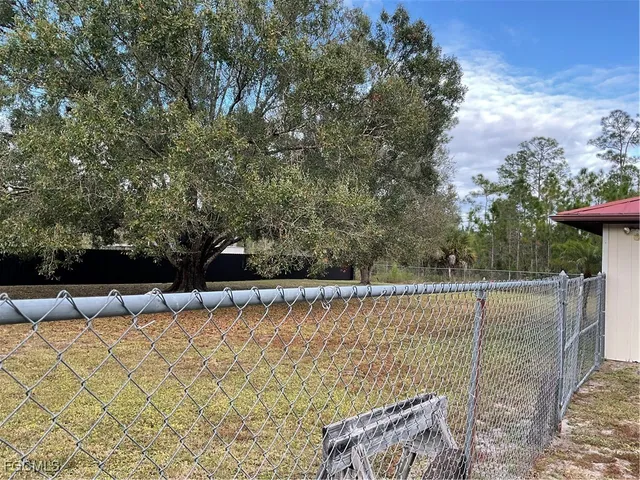 $299,900 | 1002 Michael Avenue, Lehigh Acres, FL 33936