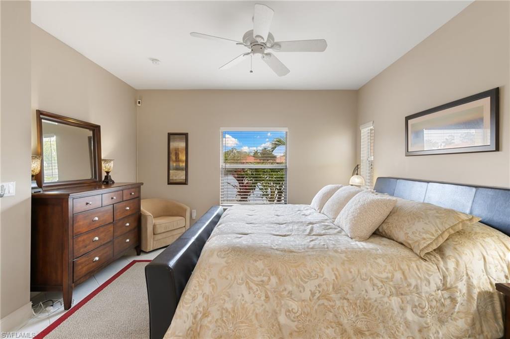 8140 Chancel Court, Unit 2 Naples, FL 34104 - Photo 13 of 39 Bedroom with a ceiling fan