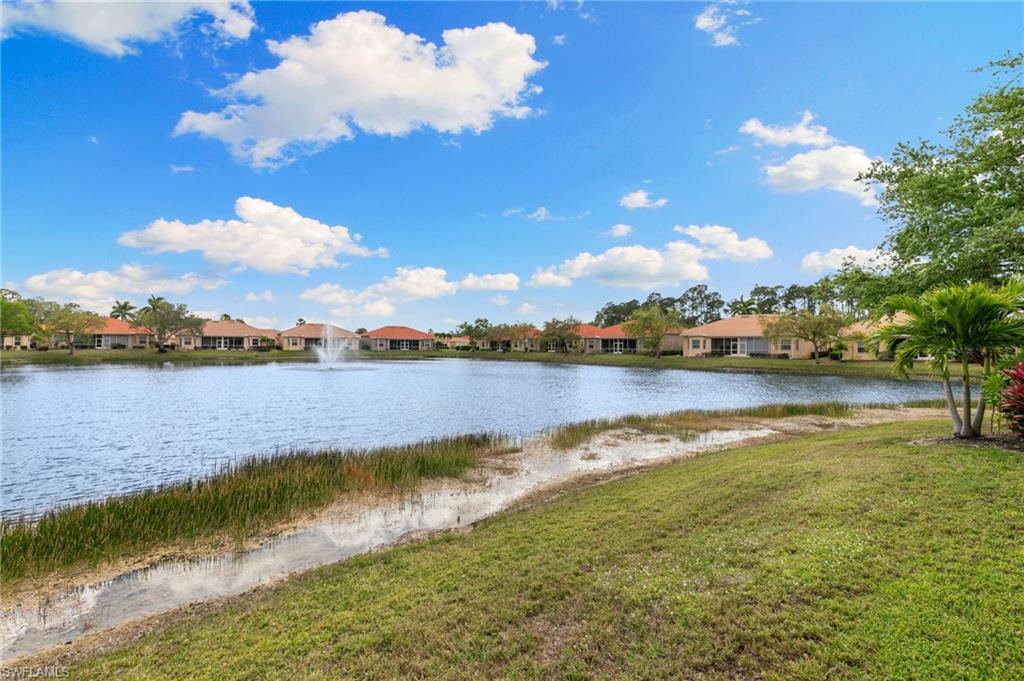 8140 Chancel Court, Unit 2 Naples, FL 34104 - Photo 24 of 39 Water view with nearby suburban area