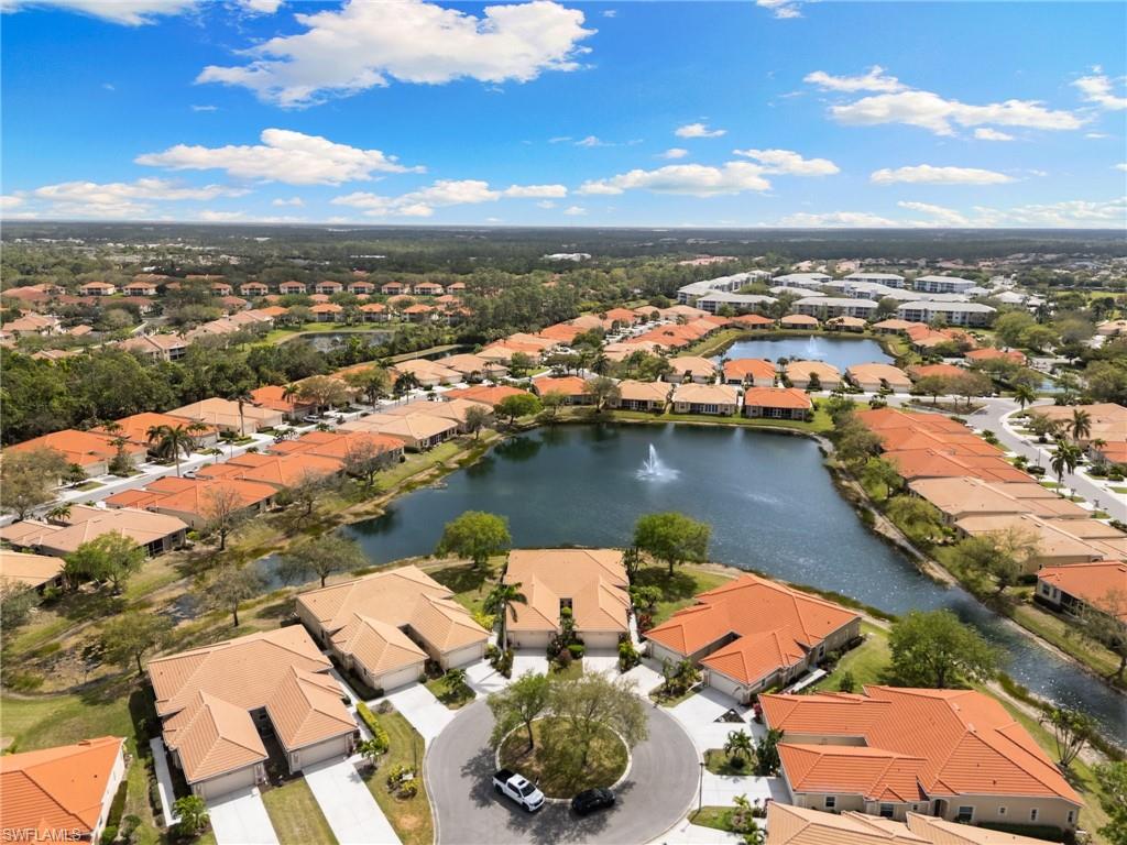 8140 Chancel Court, Unit 2 Naples, FL 34104 - Photo 31 of 39 Aerial view of residential area featuring a nearby body of water