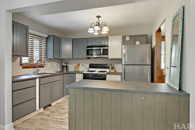 a view of a hallway with a couch