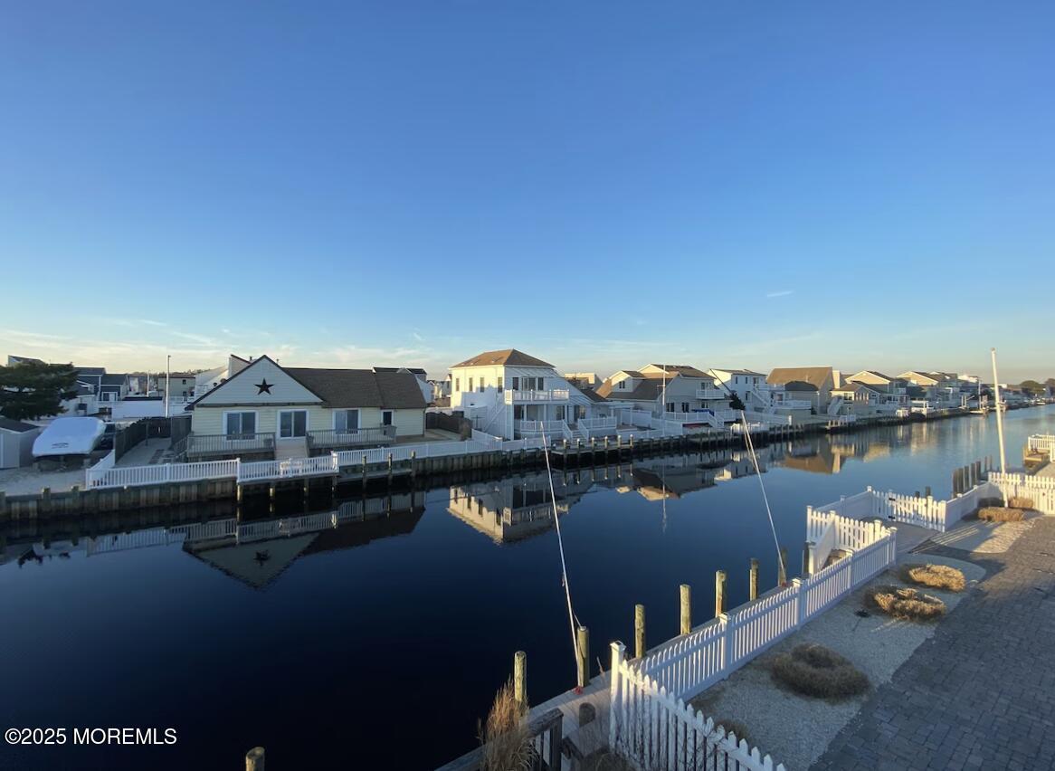 104 Catherine Lane Manahawkin, NJ 08050 - Photo 13 of 14 a view of a lake with a mountain view