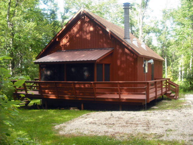 246 Stebbins Road Otis, MA 01253 - Photo 14 of 14 a view of a house with a yard