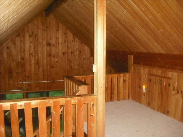 246 Stebbins Road Otis, MA 01253 - Photo 8 of 14 a view of a wooden fence