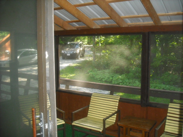 246 Stebbins Road Otis, MA 01253 - Photo 9 of 14 a view of a two chair in the balcony