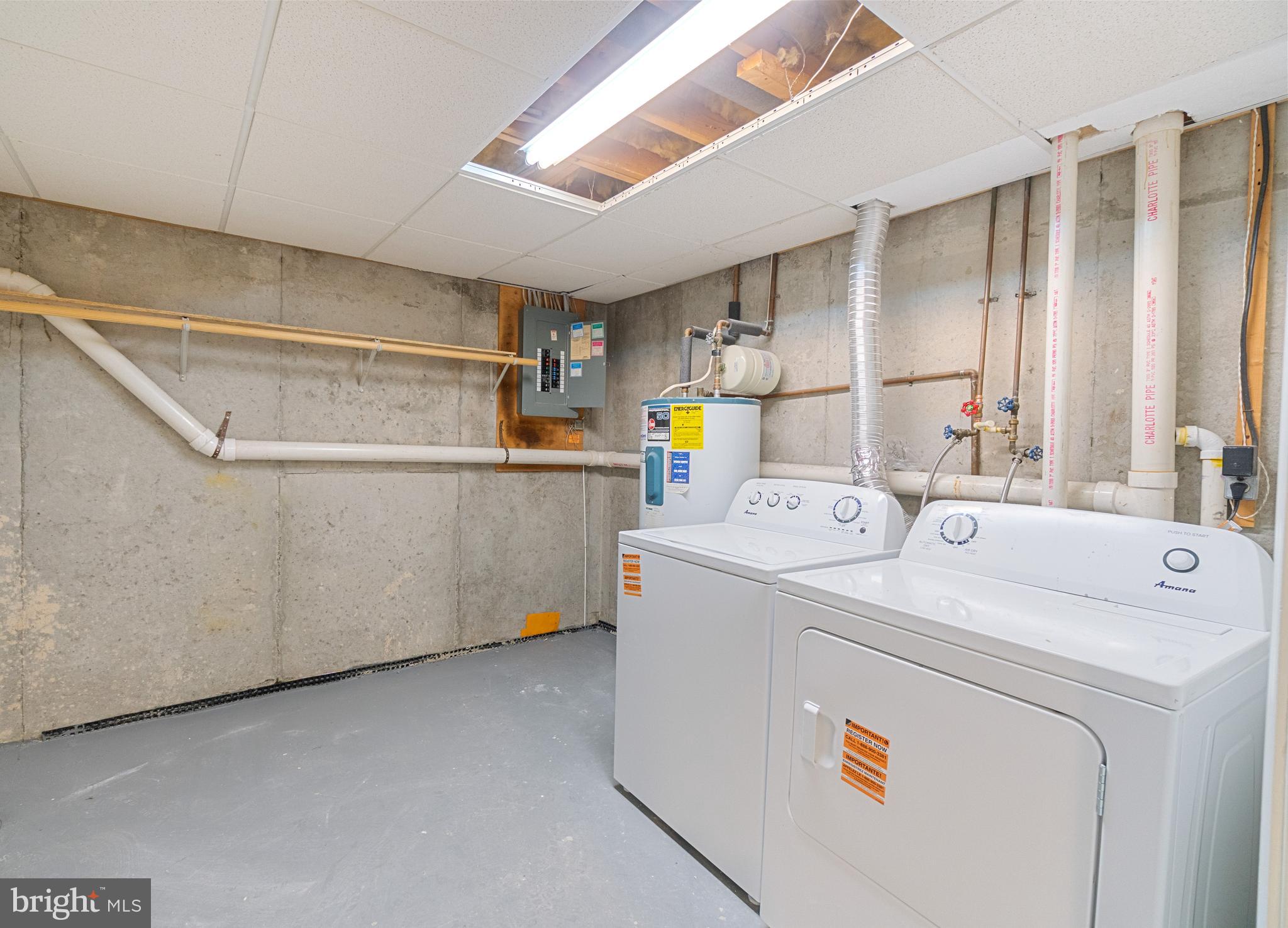 8546 Skipjack Place Pasadena, MD 21122 - Photo 16 of 20 a utility room with dryer and washer
