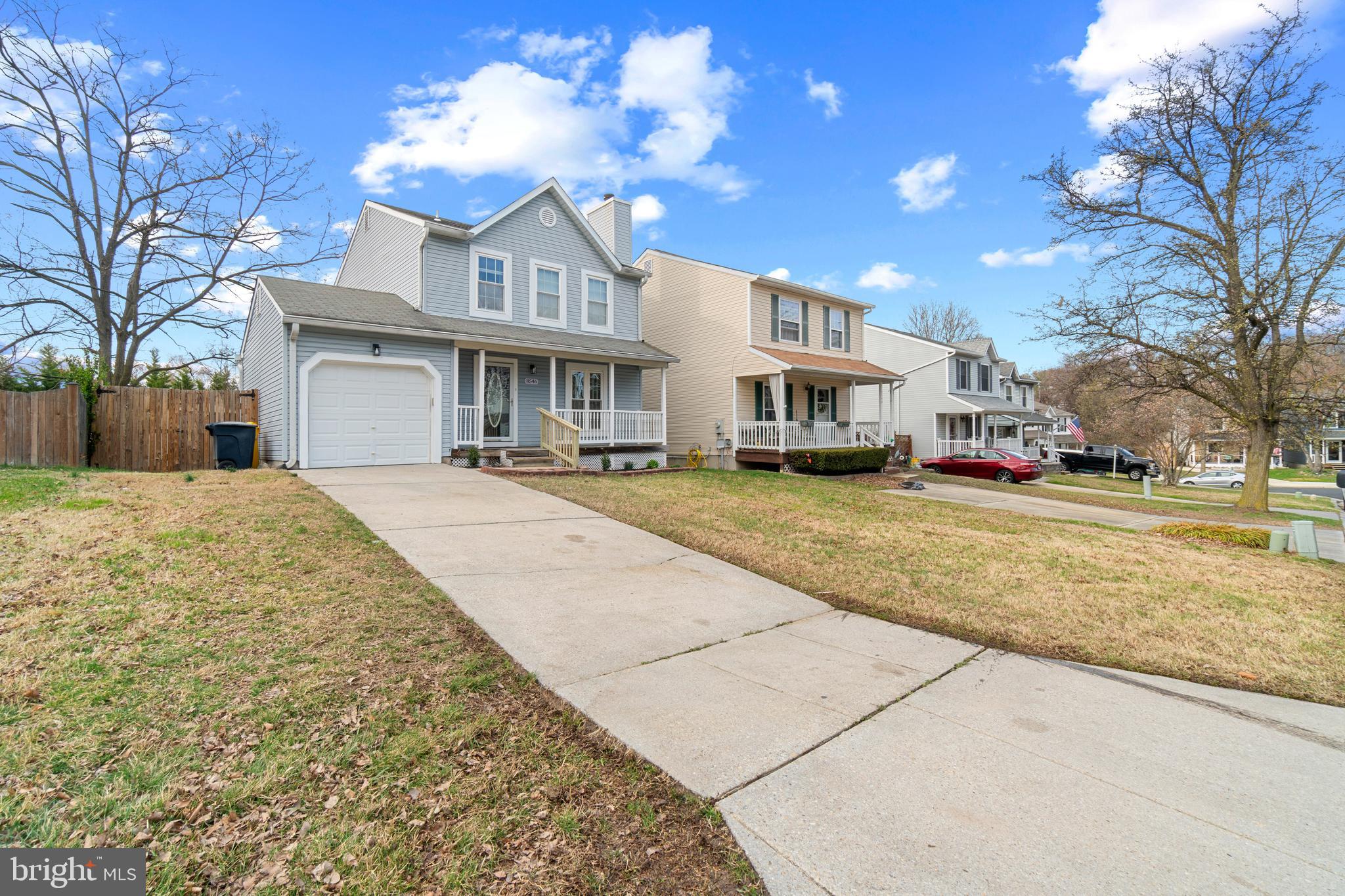 8546 Skipjack Place Pasadena, MD 21122 - Photo 19 of 20 a front view of a building with cars parked