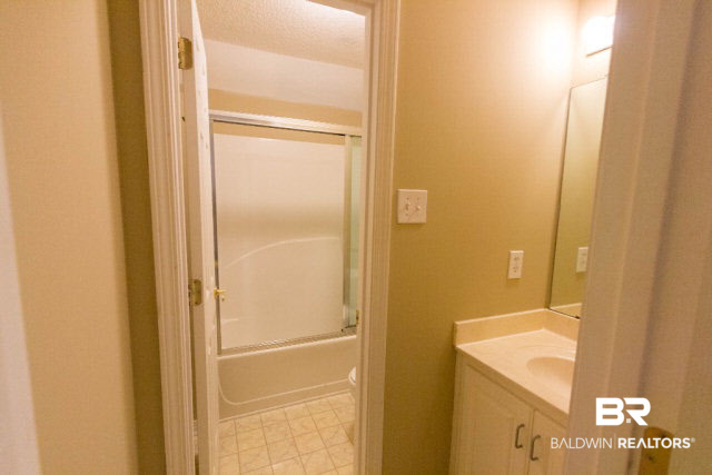 809 Henckley Avenue Mobile, AL 36609 - Photo 26 of 39 Vanity Area with Separate Water Closet