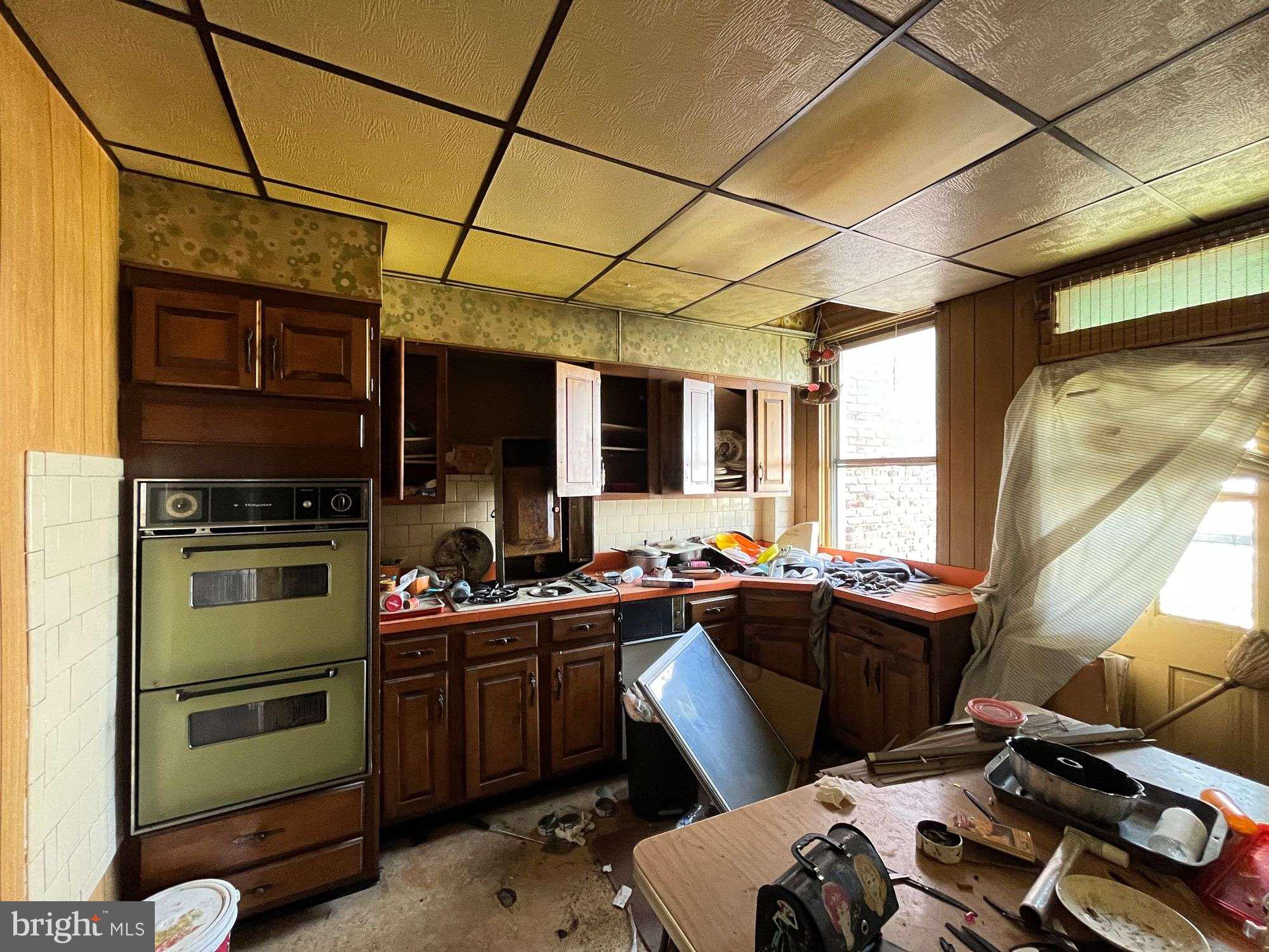 3606 Harlem Avenue Baltimore, MD 21229 - Photo 4 of 11 a kitchen with a sink appliances and cabinets