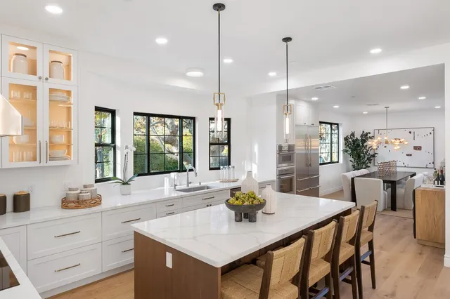 a bathroom with a toilet sink and shower