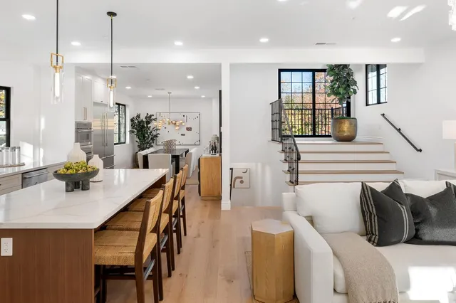 a bathroom with a sink toilet and a mirror
