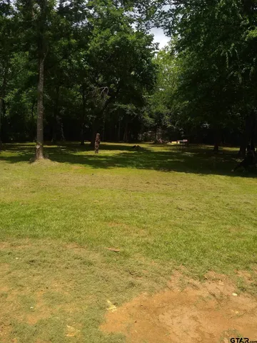 a view of outdoor space with swimming pool