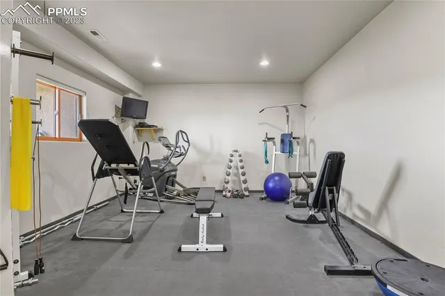 a view of a room with gym equipment