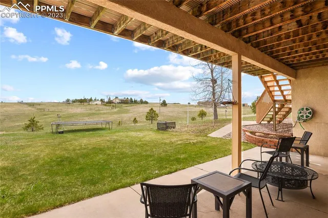 a view of a swimming pool with an ocean view