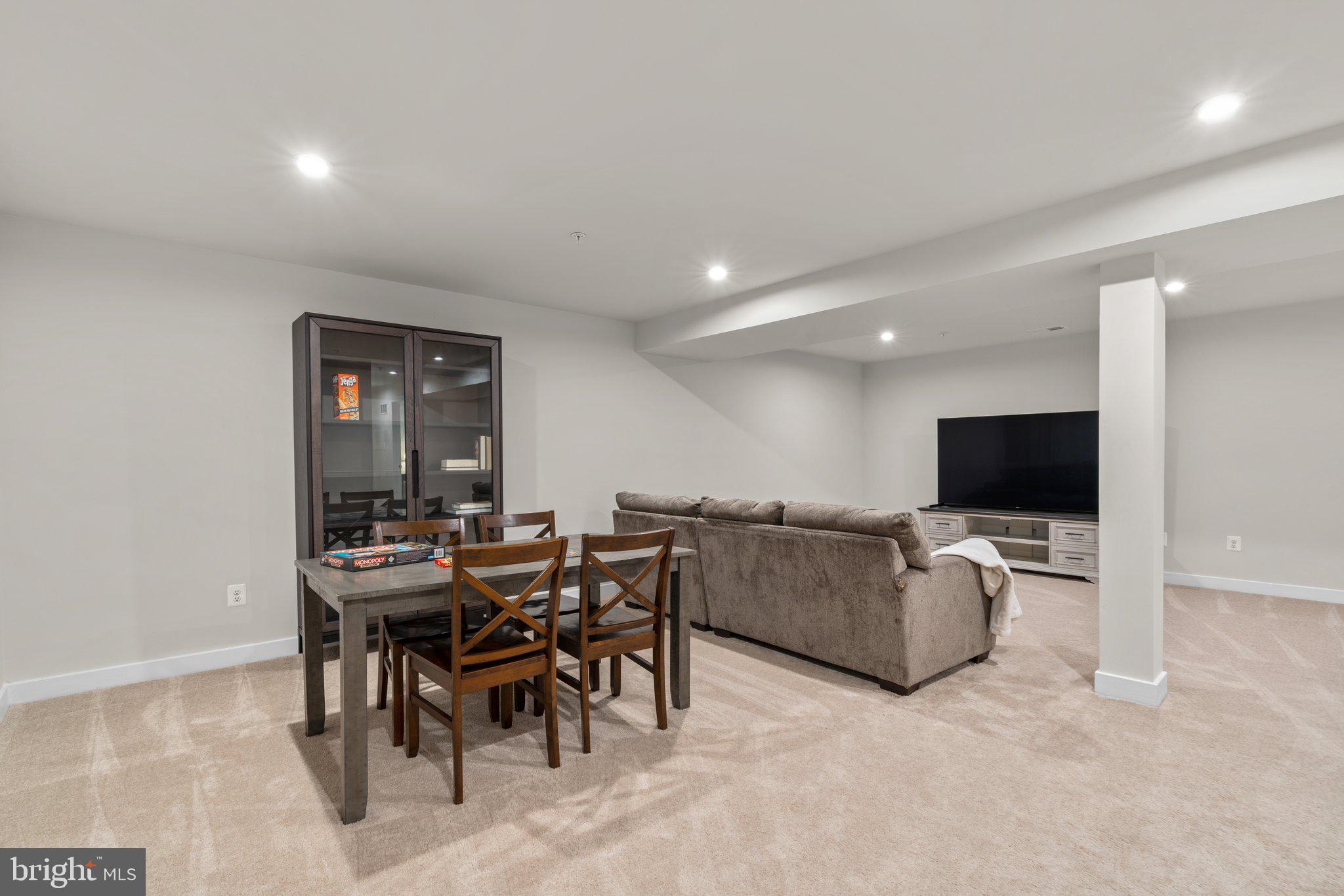 3150 Dodder Way Odenton, MD 21113 - Photo 35 of 83 a living room with furniture and a flat screen tv