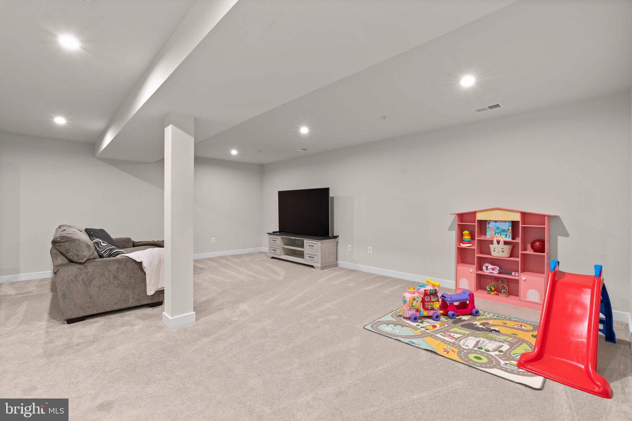 3150 Dodder Way Odenton, MD 21113 - Photo 37 of 83 a living room with furniture and a flat screen tv