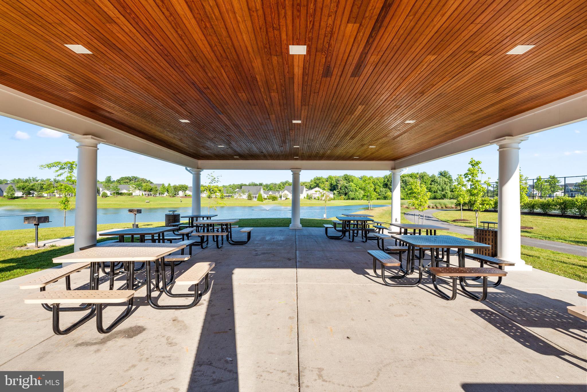 3150 Dodder Way Odenton, MD 21113 - Photo 61 of 83 a view of a patio with chairs and floor to ceiling window