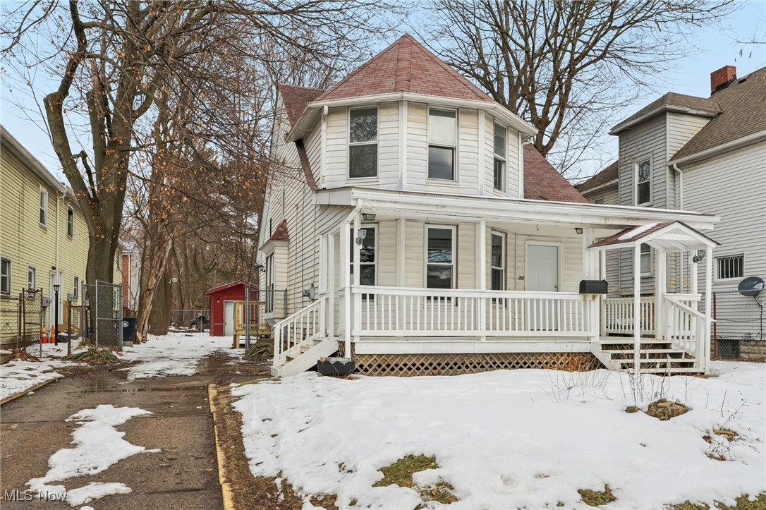 73 East York Street Akron, OH 44310 - Photo 2 of 36 Victorian home featuring a porch