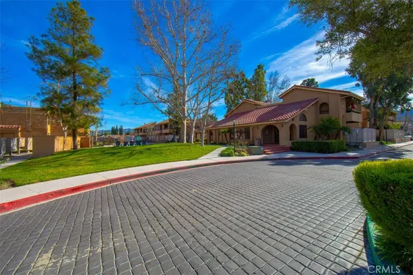 a front view of a house with a garage