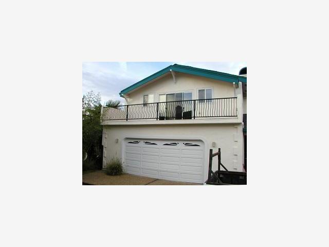a black and white photo of a house