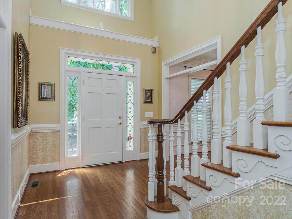 4510 Nora's Path Road Charlotte, NC 28226 - Photo 3 of 38 a view of entryway and hall with wooden floor
