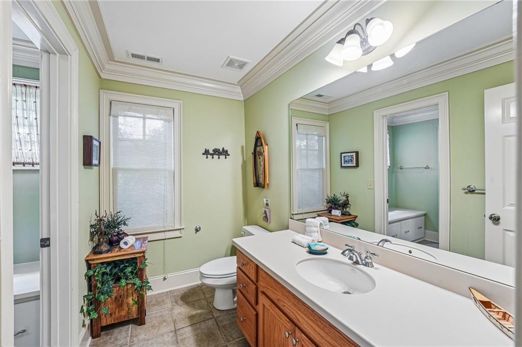 14 Laurel Ridge Lane Big Canoe, GA 30143 - Photo 43 of 72 a bathroom with a sink double vanity and a mirror