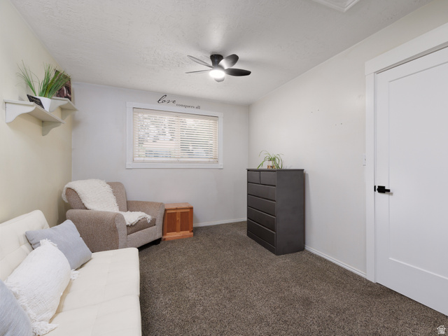 8252 Wood Street Midvale, UT 84047 - Photo 13 of 40 Room featuring wall-to-wall carpeting and a ceiling fan with integrated lighting in Primary bedroom