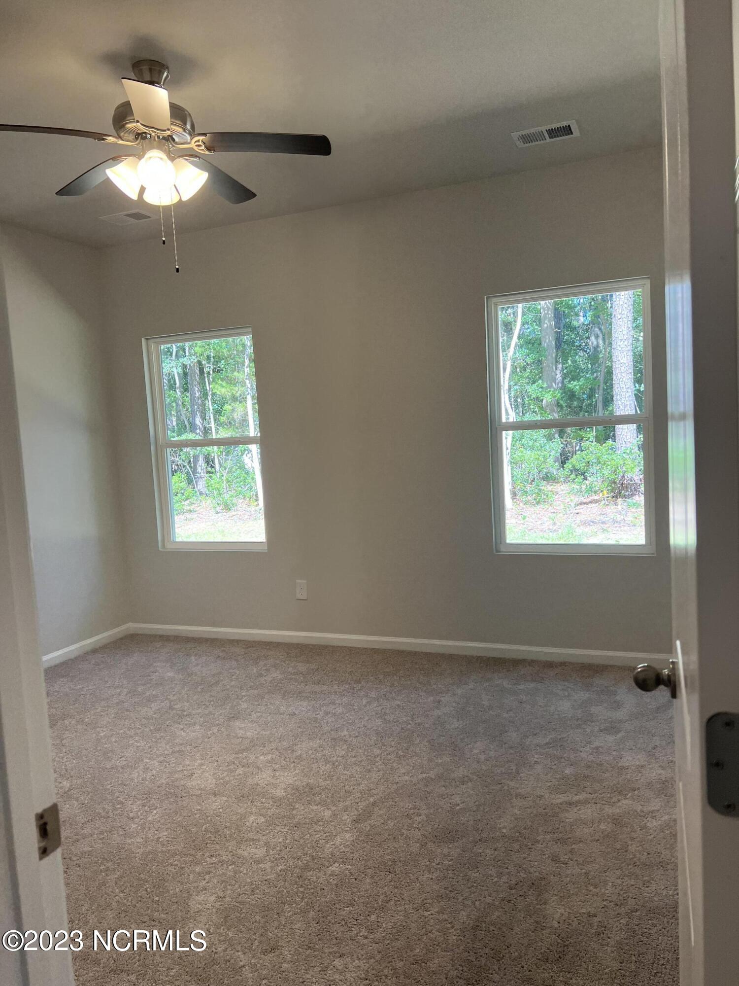 535 Greenmoss Road Southport, NC 28461 - Photo 4 of 9 Primary Suite