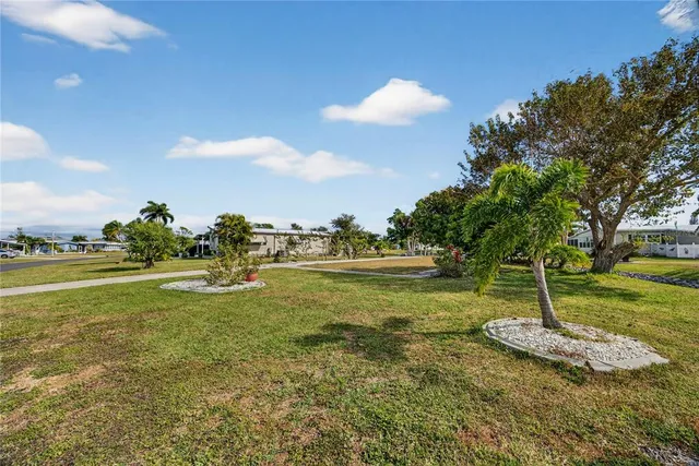 a view of a lake with a big yard
