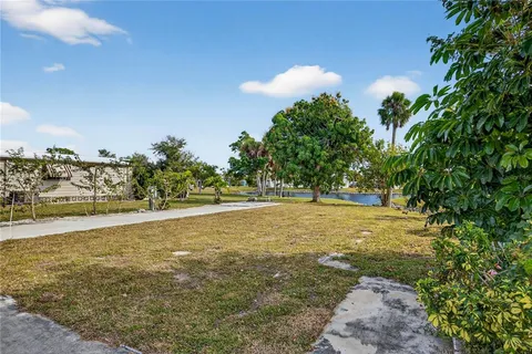 a view of an ocean and a yard