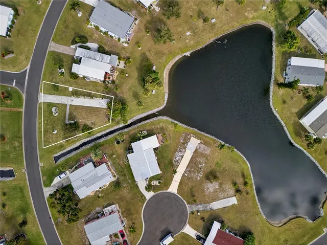 an aerial view of a house swimming pool