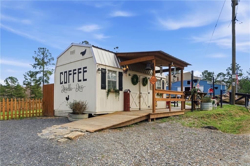 0 McPherson Church Road Dallas, GA 30132 - Photo 10 of 11 a view of a house with a backyard