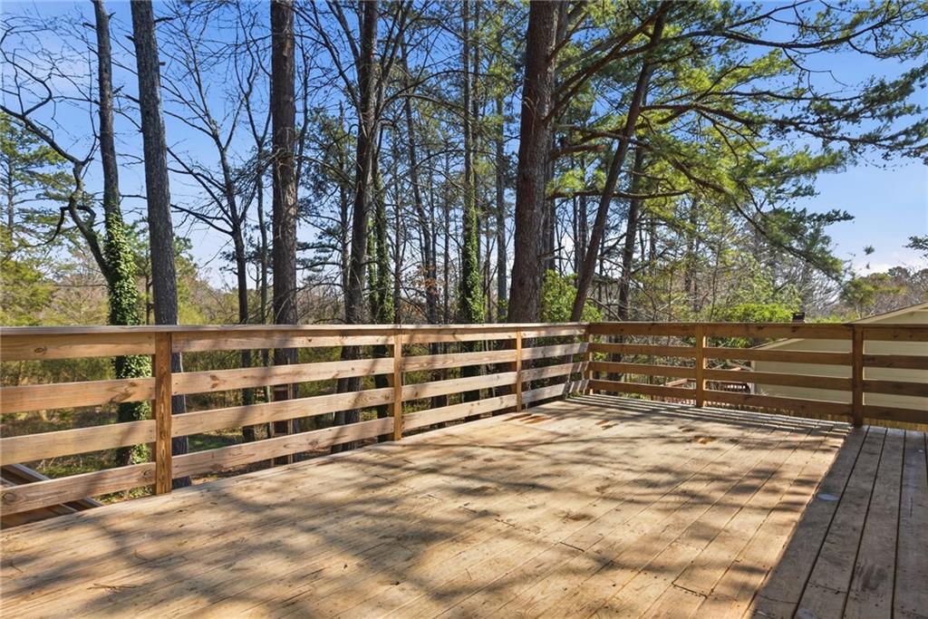 2470 Northbrook Road Snellville, GA 30039 - Photo 26 of 29 a view of backyard with wooden fence