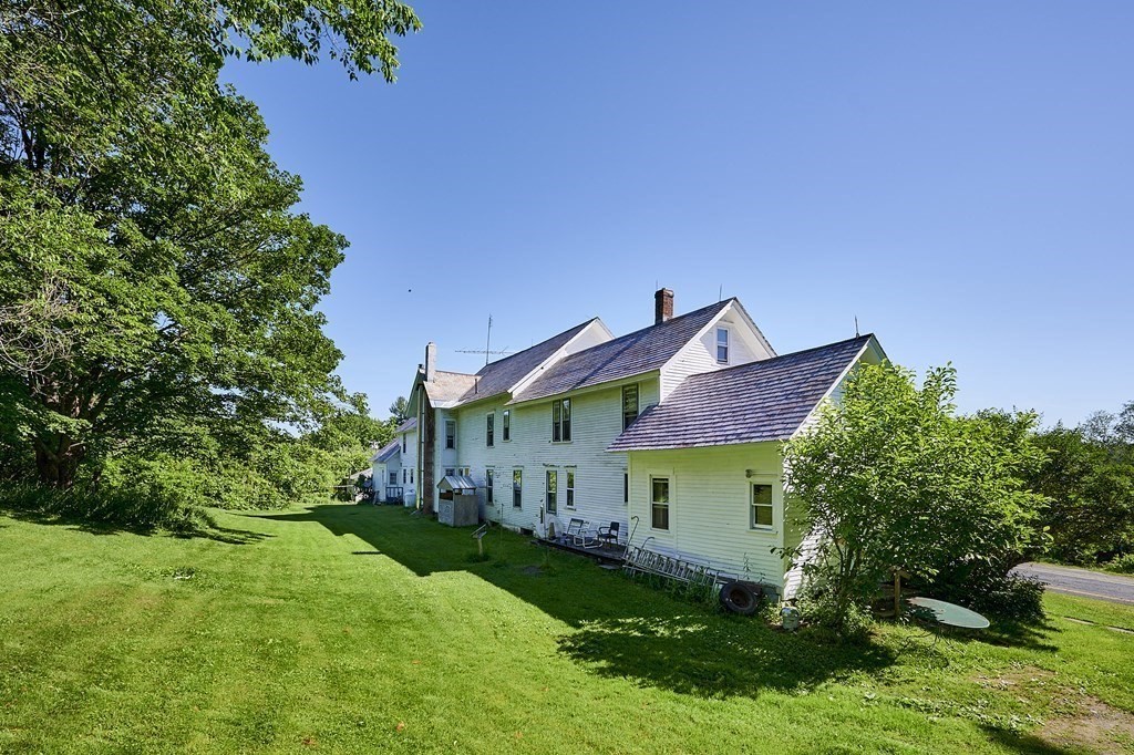 211 Greenfield Road Colrain, MA 01340 - Photo 3 of 34 a view of a house with a yard and tree s