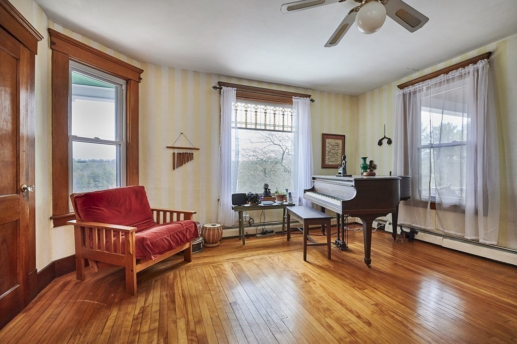 211 Greenfield Road Colrain, MA 01340 - Photo 10 of 34 a living room with furniture and wooden floor