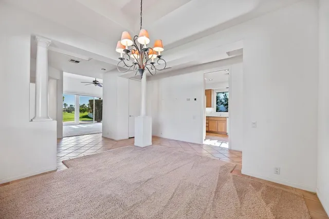 a view of a chandelier in a room