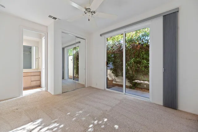 a view of a room with a large window