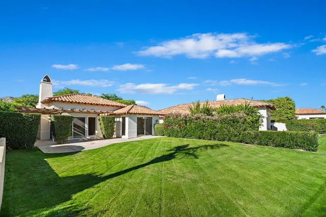 a view of a house with a big yard