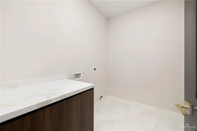 a utility room with a sink
