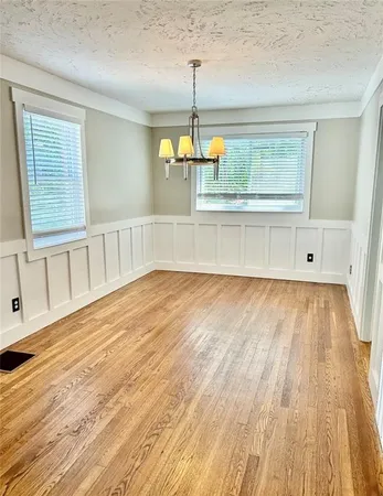 a kitchen with stainless steel appliances a refrigerator sink and cabinets